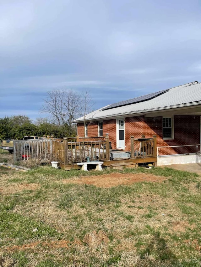 view of yard featuring a deck