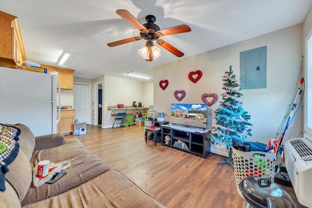 14189 Franklin St, Ferrum, VA 24088 - living room featuring ceiling fan, electric panel, and light wood-type flooring