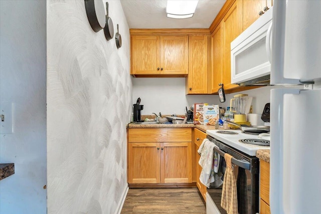 14189 Franklin St, Ferrum, VA 24088 - kitchen featuring light countertops, a sink, white appliances, and light wood-type flooring