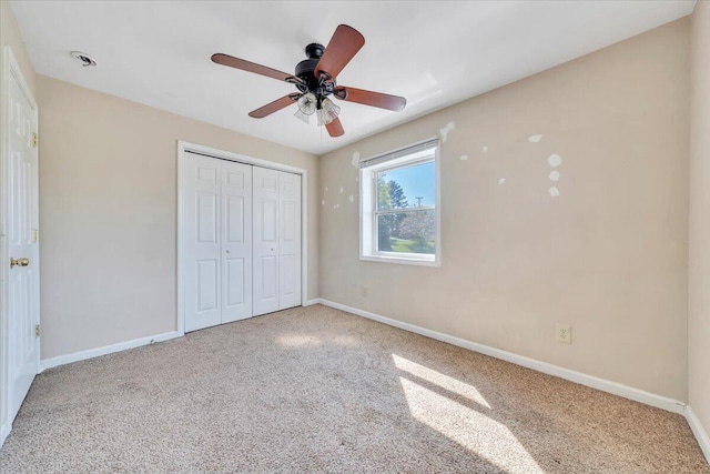 14189 Franklin St, Ferrum, VA 24088 - unfurnished bedroom with a ceiling fan, baseboards, carpet floors, and a closet