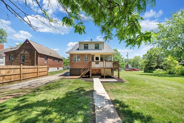 rear view of house featuring stairway and brick siding