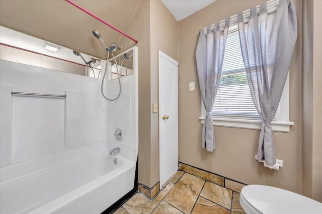 full bathroom with  shower combination and toilet