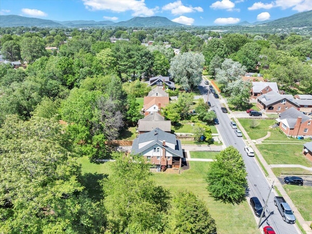 bird's eye view of mountains and a heavily wooded area
