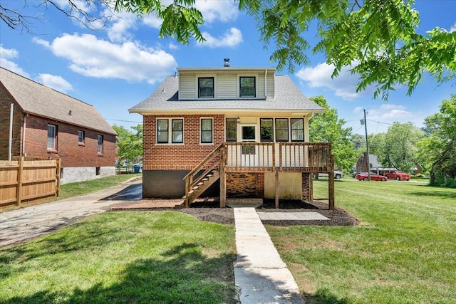 view of front of property with stairway, a wooden deck, a chimney, and roof with shingles