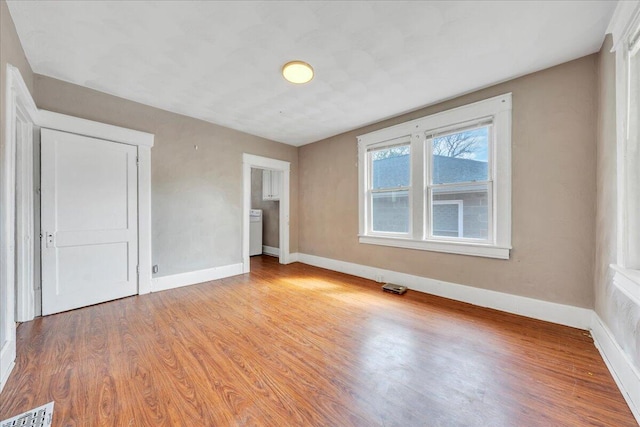 4 14th St SW, Roanoke, VA 24016 - interior space featuring baseboards, visible vents, and light wood finished floors