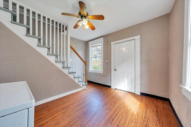 4 14th St SW, Roanoke, VA 24016 - entryway featuring stairs, a ceiling fan, baseboards, and wood finished floors