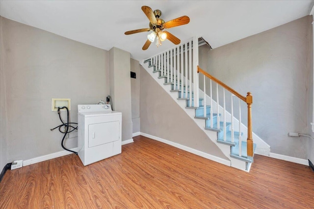 4 14th St SW, Roanoke, VA 24016 - clothes washing area with laundry area, a ceiling fan, baseboards, washer / dryer, and wood finished floors