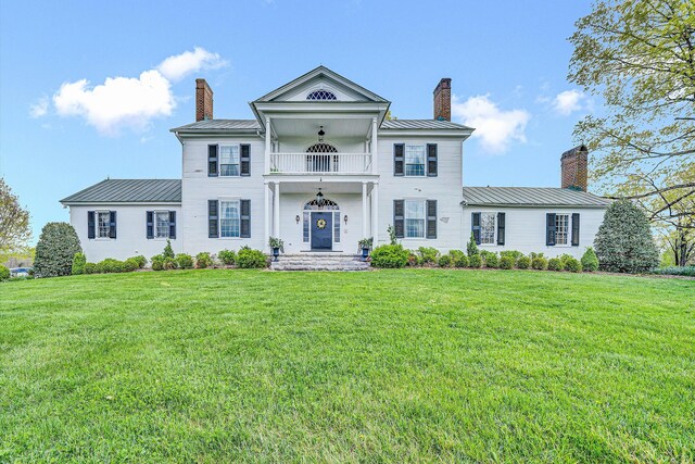 420 S Church St, Fincastle, VA 24090 - greek revival inspired property featuring a chimney, a balcony, and metal roof