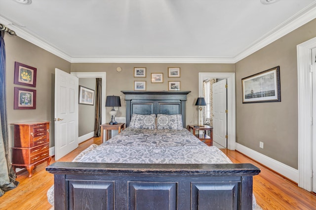 420 S Church St, Fincastle, VA 24090 - bedroom featuring crown molding, light wood finished floors, and baseboards