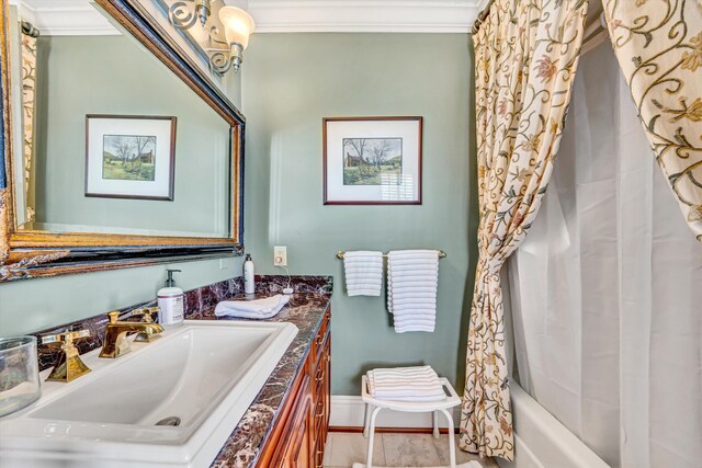 420 S Church St, Fincastle, VA 24090 - bathroom with ornamental molding, vanity, baseboards, and shower / tub combo with curtain