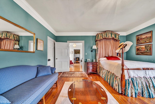 420 S Church St, Fincastle, VA 24090 - bedroom with wood-type flooring and crown molding