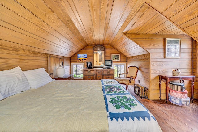 420 S Church St, Fincastle, VA 24090 - bedroom featuring wooden ceiling, wooden walls, hardwood / wood-style floors, and vaulted ceiling
