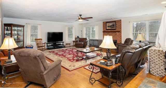 2902 Brughs Mill Rd, Fincastle, VA 24090 - living area with a ceiling fan, a fireplace, wood-type flooring, and plenty of natural light