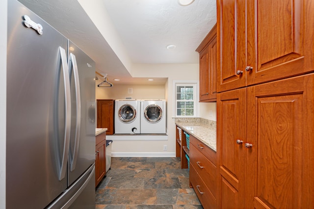 2902 Brughs Mill Rd, Fincastle, VA 24090 - laundry room featuring stone finish floor, baseboards, separate washer and dryer, recessed lighting, and laundry area