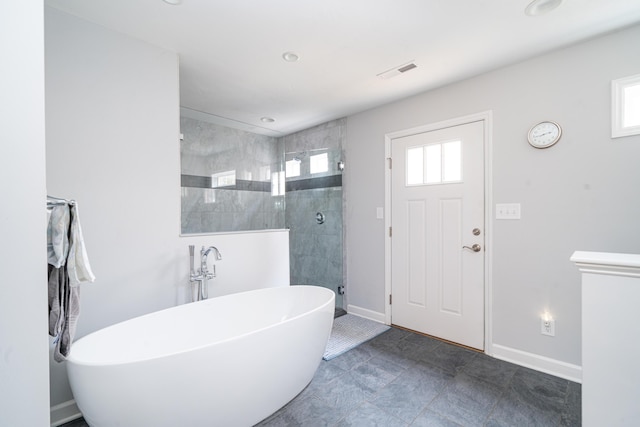 2902 Brughs Mill Rd, Fincastle, VA 24090 - bathroom featuring a freestanding tub, visible vents, a shower stall, and plenty of natural light