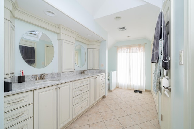 2902 Brughs Mill Rd, Fincastle, VA 24090 - full bath with double vanity, a sink, vaulted ceiling, and visible vents