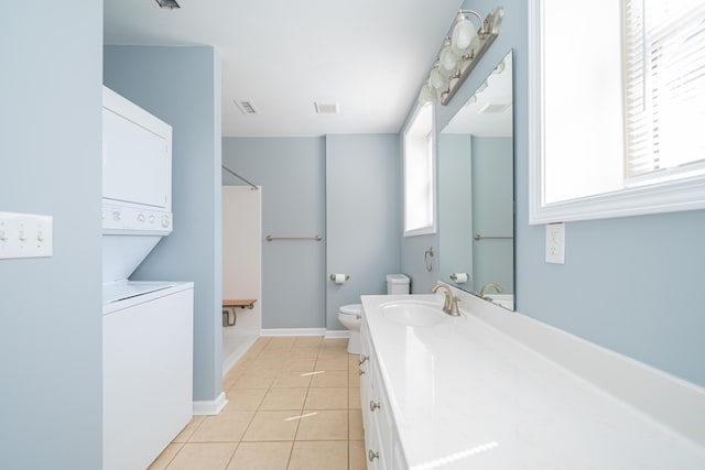 2902 Brughs Mill Rd, Fincastle, VA 24090 - full bathroom with vanity, toilet, visible vents, stacked washer / dryer, and tile patterned flooring