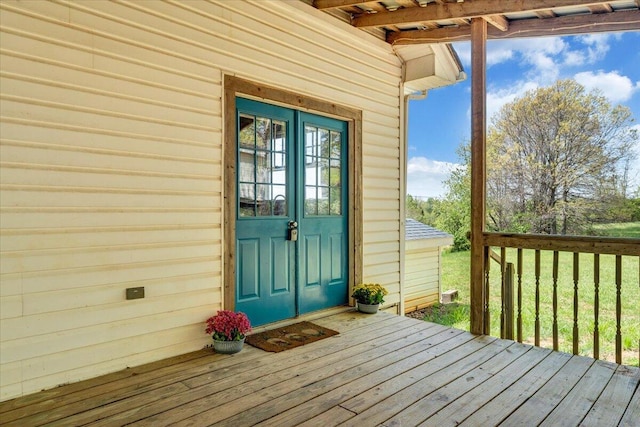doorway to property with a deck