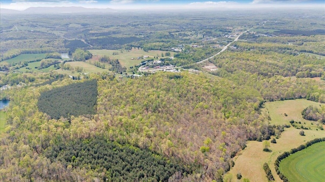 aerial view featuring a forest view