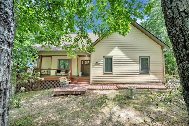 30 Boulder Point Dr, Hardy, VA 24101 - view of front of house featuring a wooden deck and a shingled roof