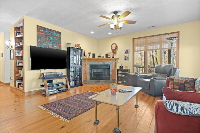 30 Boulder Point Dr, Hardy, VA 24101 - living room with wood finished floors, ceiling fan, a fireplace, recessed lighting, and baseboards