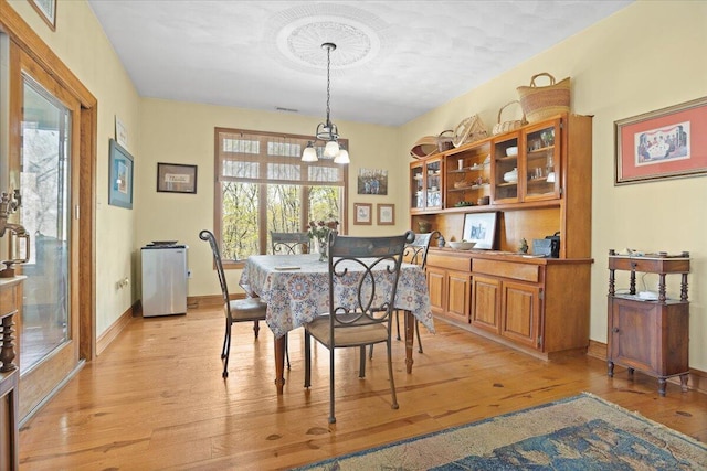 30 Boulder Point Dr, Hardy, VA 24101 - dining space featuring healthy amount of natural light, light wood finished floors, a chandelier, and baseboards