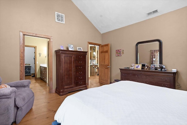 30 Boulder Point Dr, Hardy, VA 24101 - bedroom with light wood-type flooring, high vaulted ceiling, and ensuite bath