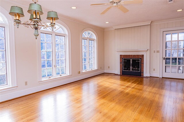 2912 Wycliffe Ave SW, Roanoke, VA 24014 - unfurnished living room with ceiling fan, crown molding, wood finished floors, and plenty of natural light