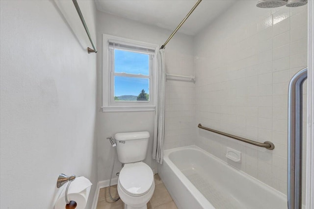 bathroom featuring baseboards, tile patterned floors, shower / bath combination with curtain, and toilet