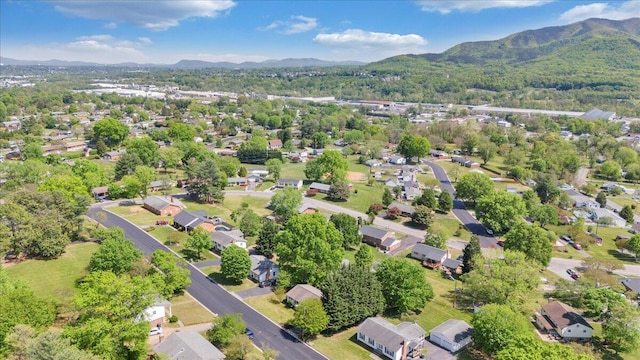 birds eye view of property featuring a residential view and a mountain view