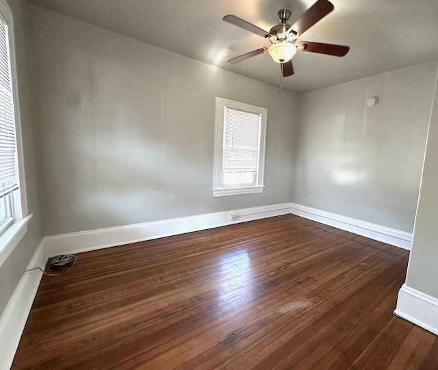 1414 Wise Ave SE, Roanoke, VA 24013 - spare room with dark wood-style floors, plenty of natural light, and a ceiling fan