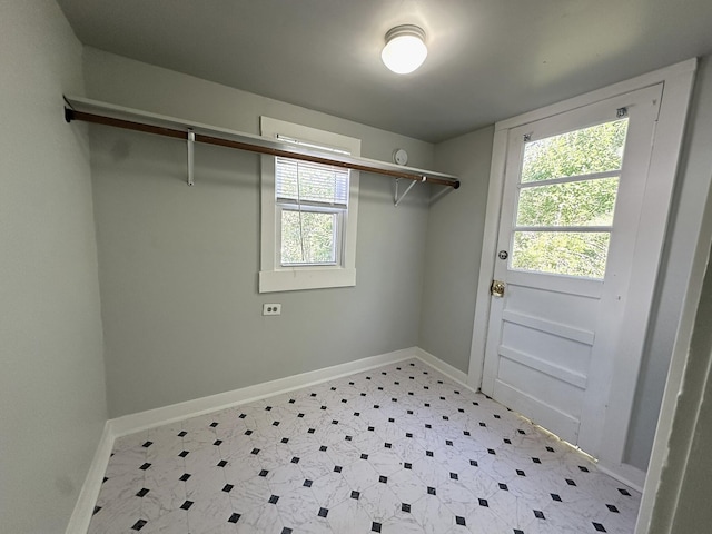 1414 Wise Ave SE, Roanoke, VA 24013 - laundry room featuring light floors and baseboards