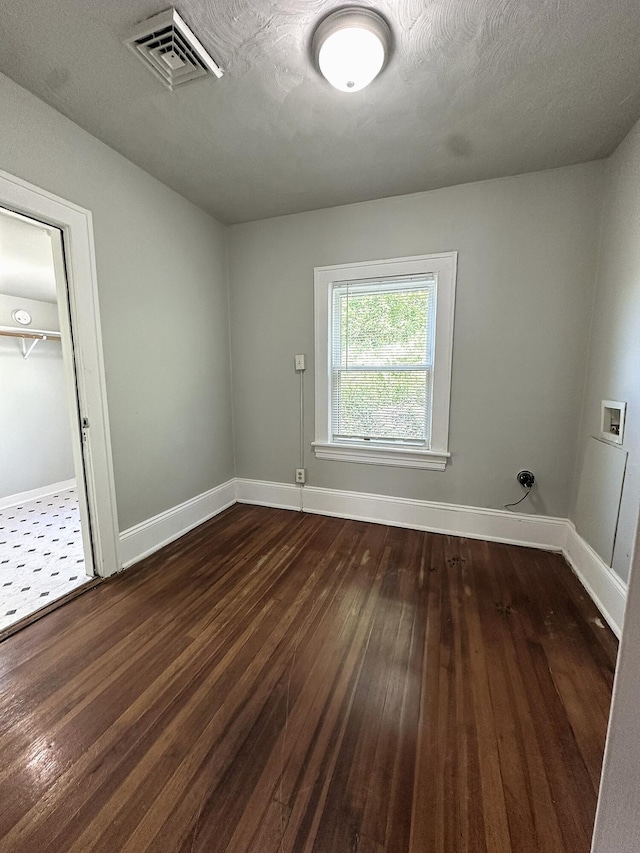 1414 Wise Ave SE, Roanoke, VA 24013 - unfurnished room featuring dark wood-style floors and baseboards