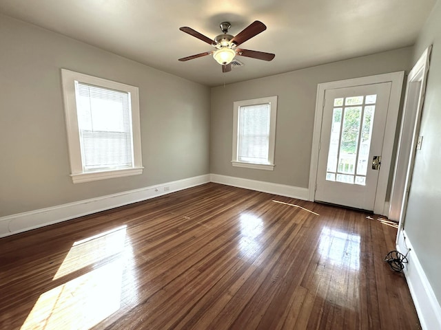 1414 Wise Ave SE, Roanoke, VA 24013 - spare room featuring baseboards, dark wood finished floors, and a ceiling fan