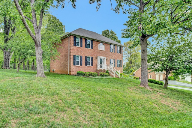 72 Windsor Ct, Roanoke, VA 24019 - colonial house featuring brick siding and a garage