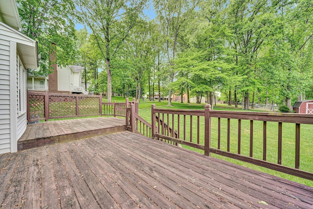 72 Windsor Ct, Roanoke, VA 24019 - wooden terrace with a lawn, view of scattered trees, an outbuilding, and a storage unit