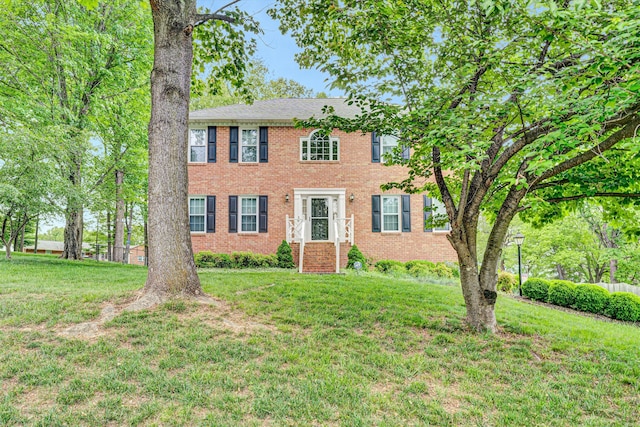 72 Windsor Ct, Roanoke, VA 24019 - colonial home featuring a front lawn and brick siding