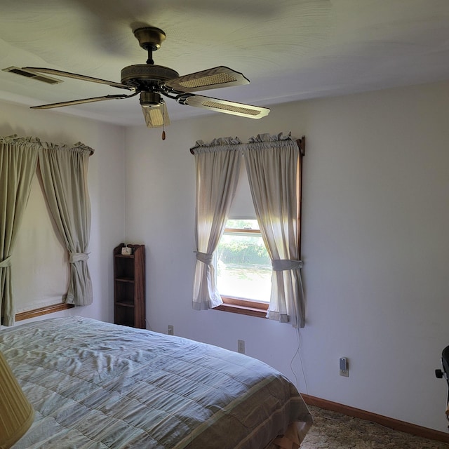 1106 Hogan Rd, Blue Ridge, VA 24064 - bedroom with visible vents, baseboards, ceiling fan, and carpet floors
