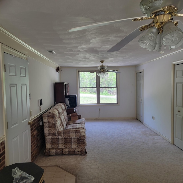 1106 Hogan Rd, Blue Ridge, VA 24064 - living area featuring visible vents, crown molding, ceiling fan, and light carpet
