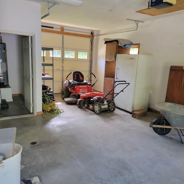 1106 Hogan Rd, Blue Ridge, VA 24064 - garage featuring water heater and a garage door opener