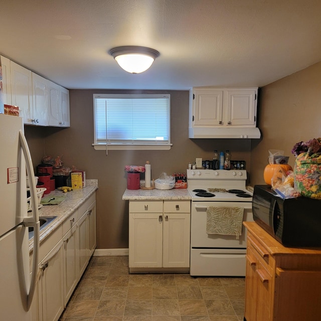 1106 Hogan Rd, Blue Ridge, VA 24064 - kitchen featuring white appliances, white cabinetry, and under cabinet range hood