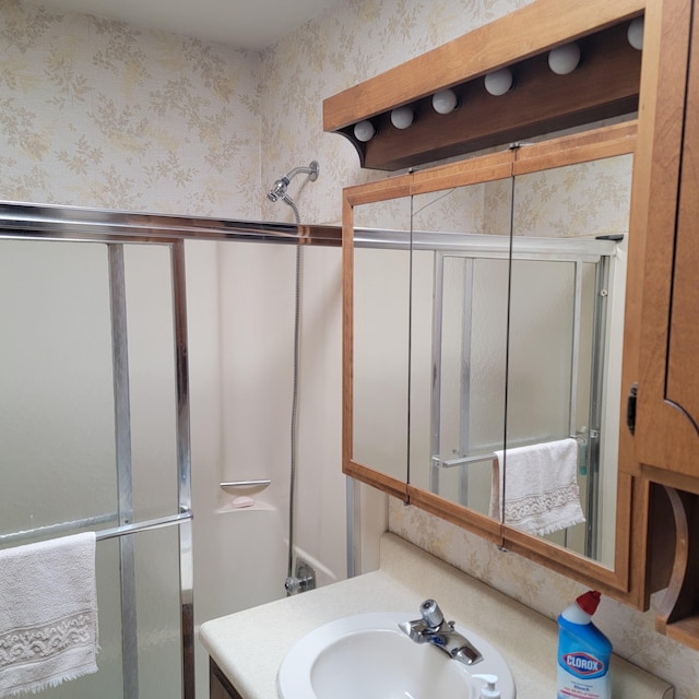 1106 Hogan Rd, Blue Ridge, VA 24064 - bathroom featuring vanity, a shower with door, and wallpapered walls