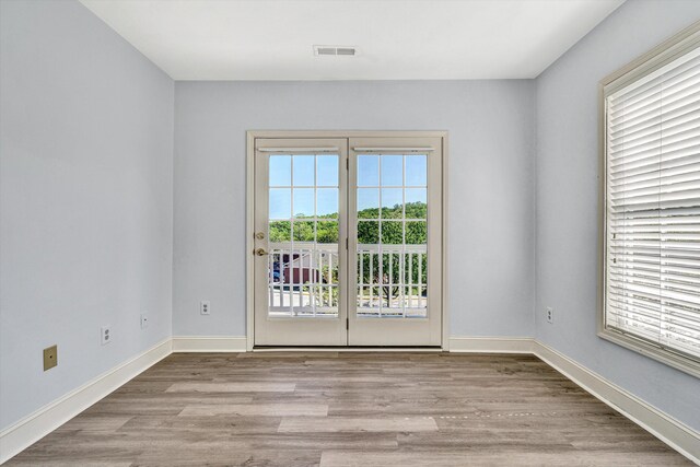 4444 Pheasant Ridge Rd Unit 206, Roanoke, VA 24014 - empty room with baseboards, wood finished floors, and visible vents