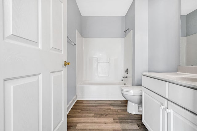 4444 Pheasant Ridge Rd Unit 206, Roanoke, VA 24014 - bathroom featuring washtub / shower combination, vanity, toilet, and wood finished floors