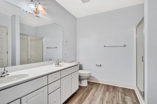 4444 Pheasant Ridge Rd Unit 206, Roanoke, VA 24014 - full bathroom featuring wood finished floors, a sink, a stall shower, and double vanity