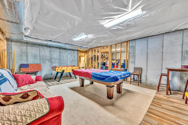 playroom featuring wood finished floors and pool table