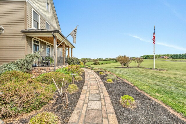 view of yard featuring a porch