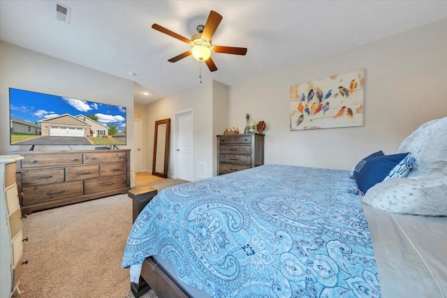 carpeted bedroom featuring ceiling fan