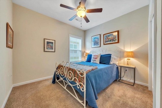 bedroom featuring carpet, baseboards, and ceiling fan