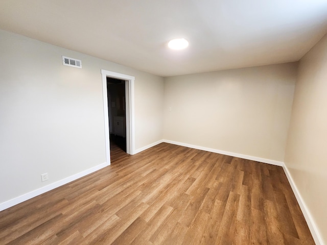 1322 S David Ave, Covington, VA 24426 - empty room featuring baseboards, visible vents, and light wood-style flooring